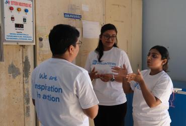 National UN Volunteers support UNICEF immunization efforts in Nepal. In this photo, Ashok Kumar Joshi (left), Social Behavior Change Officer, Aarati Poudel (right), Cold Chain Specialist and Reshu Kuskusmia (middle), Health Data and Information Technician. 