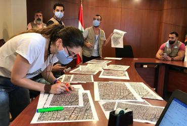 National UN Volunteer Christel Bercachy (front left) during a training session at the Municipality of Bourj Hammoud, on the first day of the Rapid Damage Assessment of the Port of Beirut blast, August 2020.