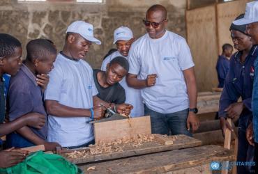 Commemorating IVD 2022 by donating carpentry material to APROJED, an organization that provides vocational training in carpentry to former child soldiers.