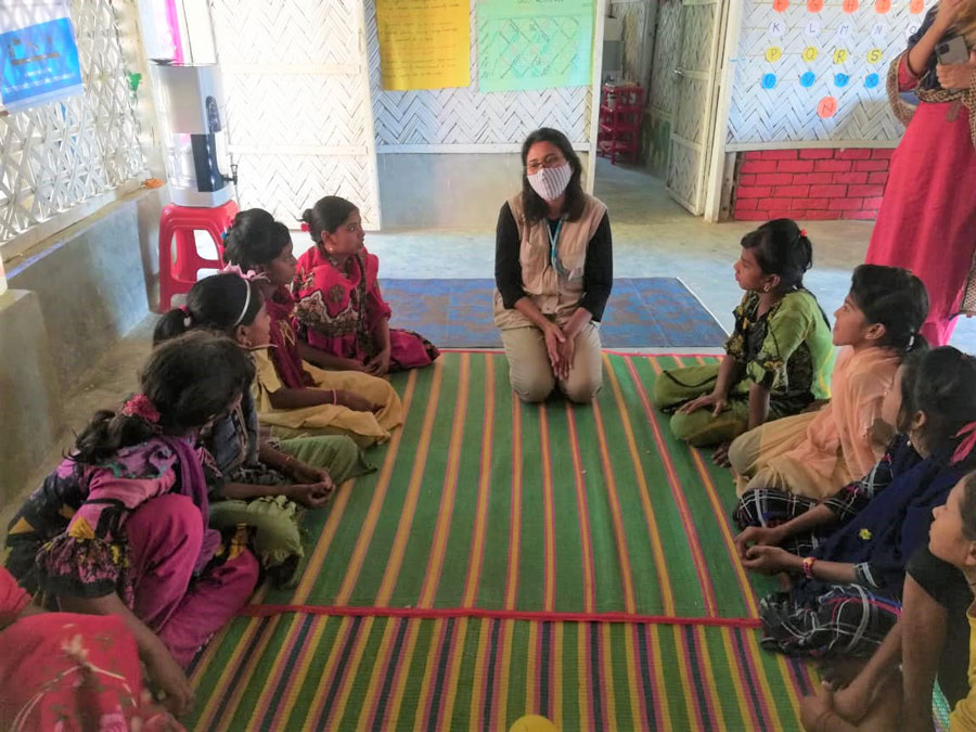 National UN Volunteer Hridita Syeda, Child Protection Officer with UNICEF at Cox’s Bazar, visiting a multi-purpose centre for child protection in a refugee camp.