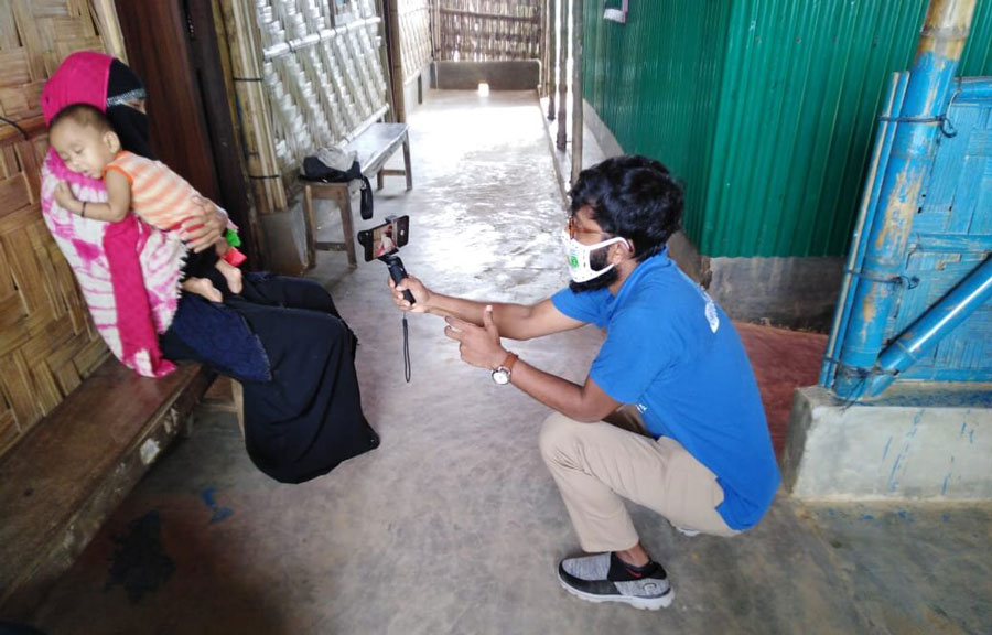 National UN Volunteer Md. Yeasir Arafat, Knowledge Management Officer with UNICEF, capturing footage for the Nutrition Sector's stories and documentaries on Cox’s Bazar. In every integrated nutrition facility, they are providing nutritional services to Rohingya children and mothers to keep them well-nourished.