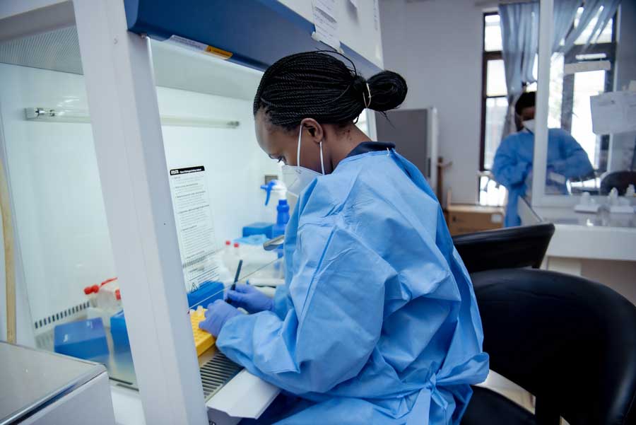 UN Volunteer Cynthia Wandabwa Wafula, Laboratory Technologist, preparing laboratory specimens at Mama Lucy Kibaki Level 4 Hospital, Nairobi County.