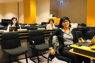 UN University Volunteer Mona Sharma (left) serves with OHCHR in Geneva, Switzerland.