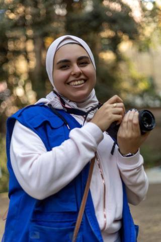 UN Volunteer Mariam el Giziry during a joint event held by IOM and UNV for International Migrants Day, in December 2022.