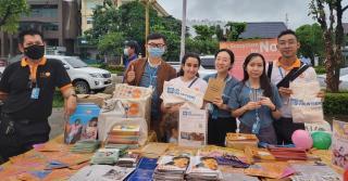 Fatima-Zahra Benyahia (third from left), international UN Volunteer Partnership and Innovation Specialist, manning the UNFPA booth at International Youth Day 2022 in Vientiane.