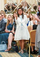 UN Volunteer Rupmani Chhetri (centre, India) addresses UN Secretary-General António Guterres in sign language.