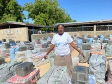 UN Volunteer Hussaina Ahmadu, serving with UNHCR, preparing non food items for internally-displaced people from Maiduguri, Nigeria, as part of an event for International Volunteer Day 2021.