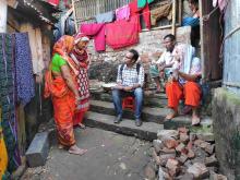 National UN Volunteer Community Organizer Afzal Hossain Sakil with UNDP in Bangladesh assesses the needs of poor communities in Chittagong.