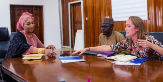 Alizée Pellen (right) UN Volunteer with UNDP meets the Ministry of Culture to organize an event during the North West Peace and Security Summit in Nigeria.