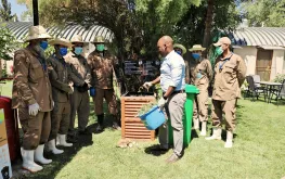 UN Volunteer Environmental Officer, Khalid Badr, demonstrates the compost activity in the UN compound in Kabul.