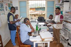 Alec Mkwamba (far right), UN Volunteer Epidemiologist and Project Manager with UNDP, interacts with colleagues in São Tomé and Príncipe.