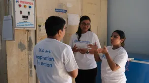 National UN Volunteers support UNICEF immunization efforts in Nepal. In this photo, Ashok Kumar Joshi (left), Social Behavior Change Officer, Aarati Poudel (right), Cold Chain Specialist and Reshu Kuskusmia (middle), Health Data and Information Technician.