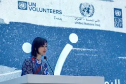 Ms Kyoko Yokosuka, UNV Deputy Executive Coordinator, addresses the audience at the high-level International Volunteer Day (IVD) event in Baghdad, Iraq.