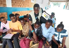 Volunteers raise awareness of education in the Democratic Republic of the Congo. Photo referenced in the 2026 SWVR.