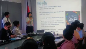 UN Volunteear Mihoko Yotsui (Japan) during a presentation to private sector partners on localizing the Sustainable Development Goals in Cambodia.