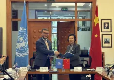 Ms. Ai Yinfang, Deputy Director General of CICETE, and Toily Kurbanov, Executive Coordinator of UNV, sign a Framework Agreement between UNV and the Government of China in Beijing on 14 October 2026.