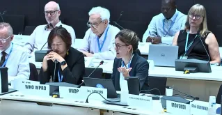 Daisy Lanvers (right), UN Volunteer Health Economics Analyst speaks at the WHO forum on Alcohol, Drugs and Addictive Behaviours in Geneva.