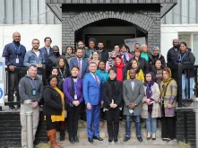 Toily Kurbanov, UNV Executive Coordinator, with UN Volunteers in Kabul, Afghanistan, on International Volunteer Day 2021.