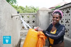 In Eritrea, a lady fetches water in Debub region.