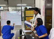 FFT volunteer Nisanart Yeamkhong supports the COVID-19 data entry and processing team at the Royal Centre for Disease Control in Bhutan as part of her work to set up a quality management system in the laboratory.