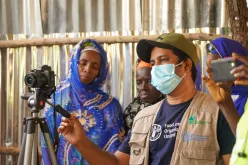 Gopi Kharel (Bhutan), UN Volunteer Communications Specialist with FAO in The Gambia, recording a video of a beneficiary to capture success stories for advocacy and communications.