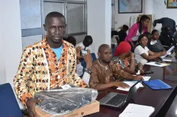 National UN Volunteers receive the required materials to support the electoral process at UNDP in Conakry, Guinea.