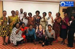 Ai Morita (Japan) serves as a UN Volunteer Peace and Development Specialist with UNDP under the Human Resource Development Programme for Peacebuilding and Development. Here, she is seen with participants in the Women in Peacebuilding Forum, Malawi.