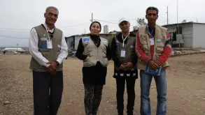 Volunteers of Handicap International in Domiz camp in Iraqi Kurdistan