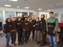 Hina Javed (third from left), international UN Volunteer, Associate Human Resource Officer with WHO Hungary poses for a photo with her colleagues.