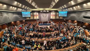 Group photo of participants who came together to recognize volunteers and celebrate the spirit of volunteerism. The high-level event in Thailand brought together more than 450 in-person at the United Nations Conference Center in Thailand.