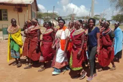 UN Volunteer Child Protection Officer with UNICEF, Faith Manyala, with women from Samburu community during a declaration ceremony to support the abandonment of female genital mutilation (FGM) in a bid to protect children from harmful cultural practices.