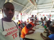 UN Volunteer Dr Innocent Nyandwi at an active case-finding community programme for TB. Such activities are key to effectively control TB, but have been disrupted due to the COVID-19 pandemic.