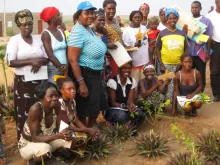 International UN Volunteer, Kirsti Mukwiilongo with UNHCR (wearing a blue cap) alongside refugee women at Sungui Refugee Camp in Bengo Province, Angola, in 2008.