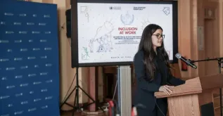 UN Volunteer Liza Al Bag with OHCHR speaks on the International Day of the Elimination of Racial Discrimination. She is part of the 2026 UNEG-UNV partnership for young evaluators.