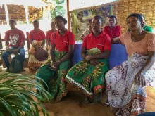 Local women join a community meeting organized by the International Organization of Migration in Madagascar.