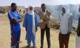 National UN Volunteer Hassane Abdoulsalamou with youth engaged in the project.