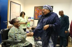 Ekaete Judith Umoh, UN Volunteer, greets UN Deputy Secretary-General, Amina Mohammed, at the UN House in Nigeria.