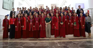 Photographed at a climate awareness training in Ashgabat, Rose Lagrotte (center) is a UN Volunteer Climate Change Associate with the UNRCO in Turkmenistan, serving on an assignment funded by France.
