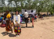 Runnan Shao, UN Volunteer Food System Analyst with WFP, pictured during a field visit in Malawi.