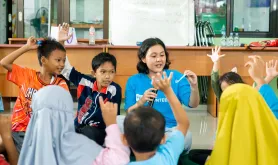 Volunteers support well-being in communities. Photo from Indonesia referenced in the 2026 SWVR.