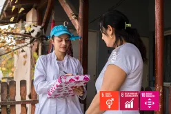 Sabina Drmaku (left) is from the Roma community and serves as a UN Community Volunteer with UNDP. Here she is seen at the Community Health Centre in the municipality of Beočini, Serbia.