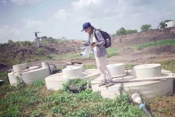 Liudmyla Odud, UN Volunteer Environmental Engineer with UNMISS, during the assessment of a wastewater treatment plant in the Akobo camp of UNMISS, South Sudan.