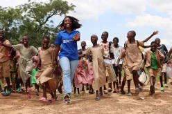 Volunteers support programme monitoring to enhance results for children in Togo. Photo referenced in 2026 SWVR.