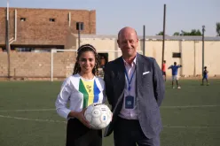 Sudan Women’s Football Team mid-fielder and UN Volunteer Azhar Sholgami (left) and UNDP Sudan’s Resident Representative Yuri Afanasiev (right)