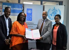 UNV Country Coordinator Moses Mubiru (left) at the signing of a secondment agreement for UN Volunteers to support the Ebola response. Next to him are UNDP Resident Representative Ms Elsie Attafua, WHO Representative Dr Yonas Tegegn Woldemariam and UNDP Deputy Representative Ms Sheila Ngatia (from left to right).