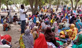 Volunteers in communities create positive change through people-to-people connections. Here, UN Community Volunteer Labbo Ladan Annour with UNDP raises awareness about gender-based violence in communities in Chad.
