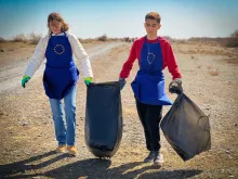 Volunteers clean the shore of Geokdepe Lake in Turkmenistan during ‘Green Games’ organized by the European Union Delegation, the Nature Protection Society of Turkmenistan, and a local mountain climbing club.