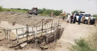 Volunteers at a site visit to assess the conditions of irrigation systems in Tuban district of Lahj, Yemen.