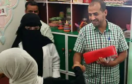 UN Volunteer Ghassan Alsanabani visiting a centre for children with special needs in Amran Governorate, Yemen.