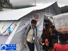 Yuichiro Yamamoto, UN Volunteer Programme Officer in Peacebuilding, serving with the Child Protection Section of UNICEF, Sierra Leone, during the emergency response that followed flooding and mudslides in the country.